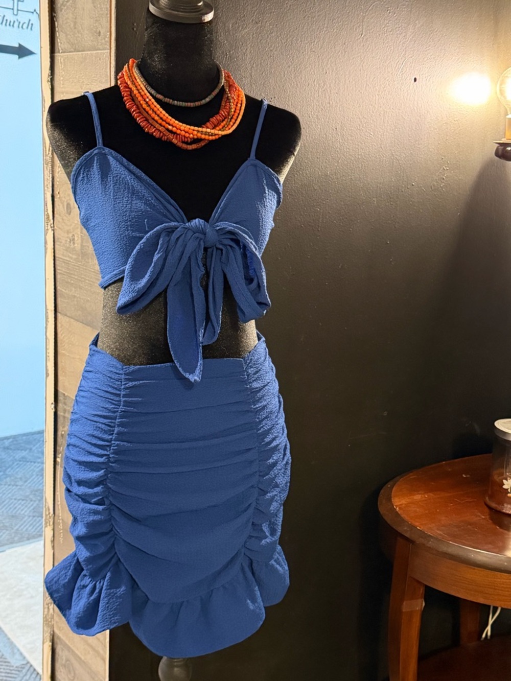 Woman’s Blue Two-Piece Ruched Set + Layered Orange Beaded Statement Necklace